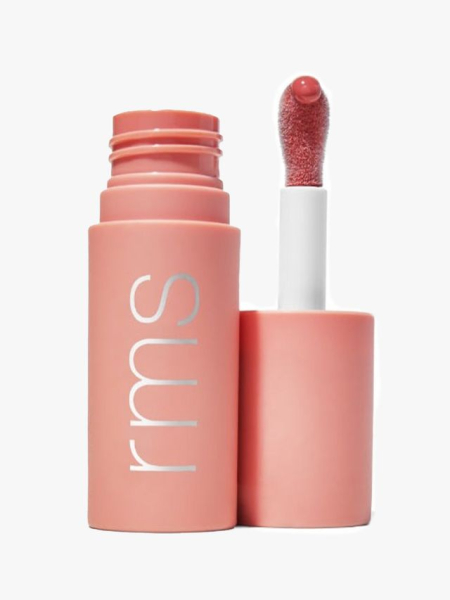 RMS Beauty Legendary Lip Oil in pink with applicator on gray background