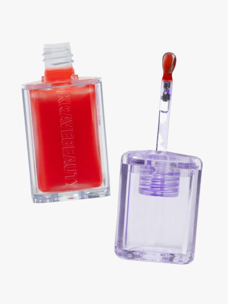 Plumptuous Lip Jelly gloss with clear purple cap on gray background