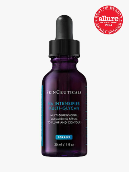 serum in branded purple bottle with black pipette on light gray background with red and white 2024 allure best of beauty seal